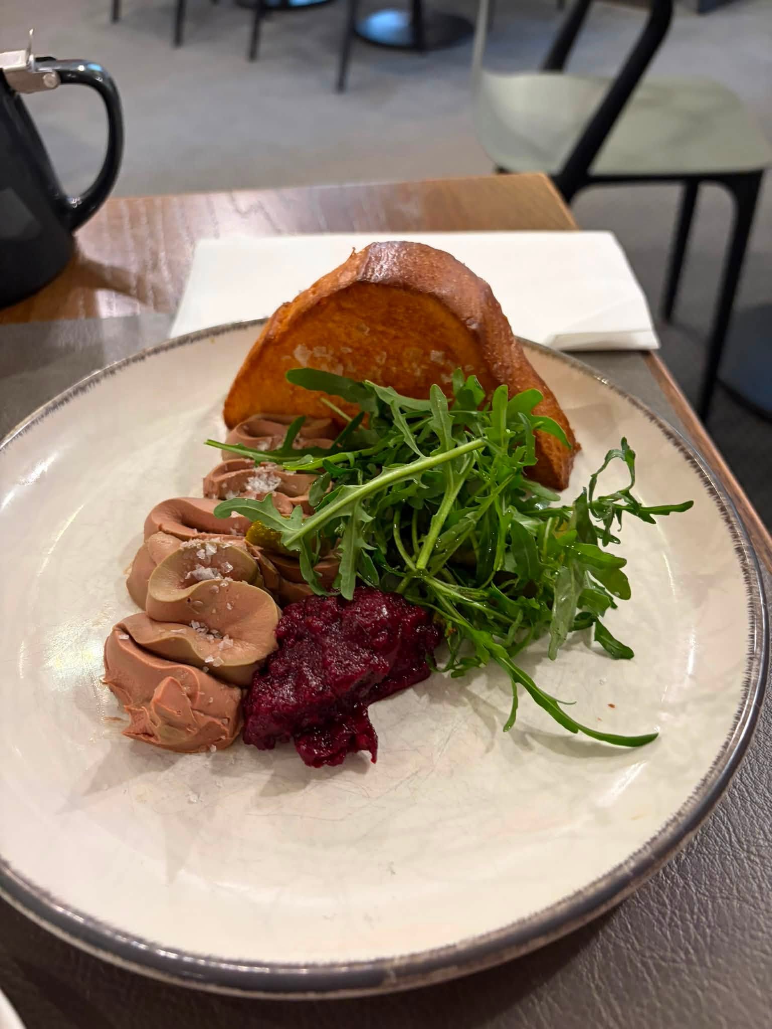 A plate of pâté, toast, chutney and rocket served at Waddesdon Manor